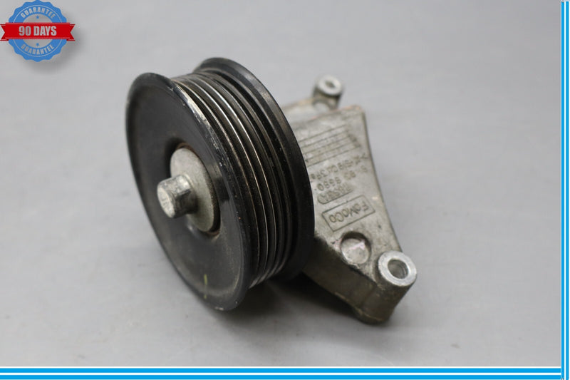Load image into Gallery viewer, 10-19 Jaguar XJ XF XK S/C Engine Lower Belt Idler Pulley Bracket w/ Pulley Oem
